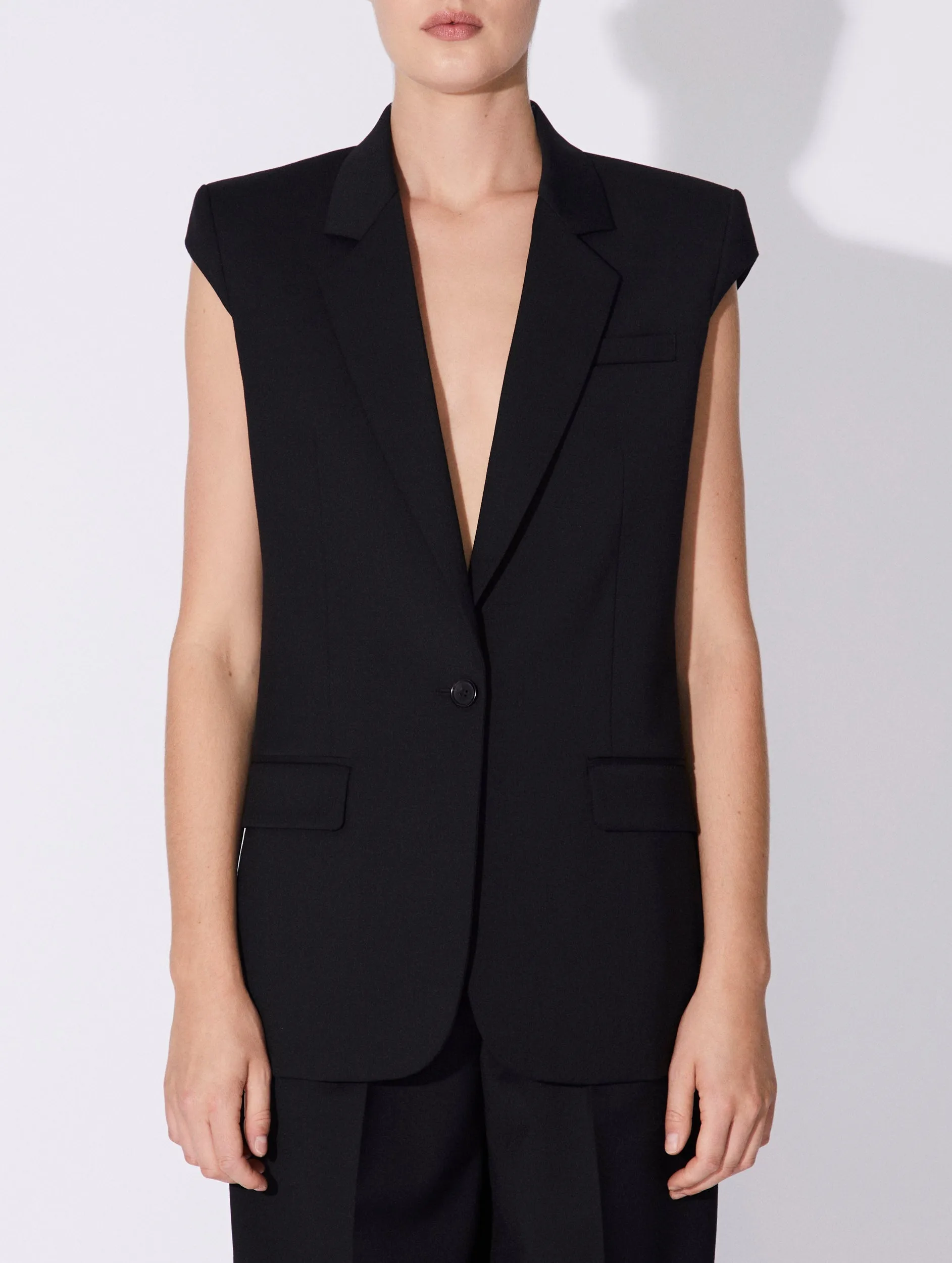 Black stretch wool gabardine sleeveless jacket
